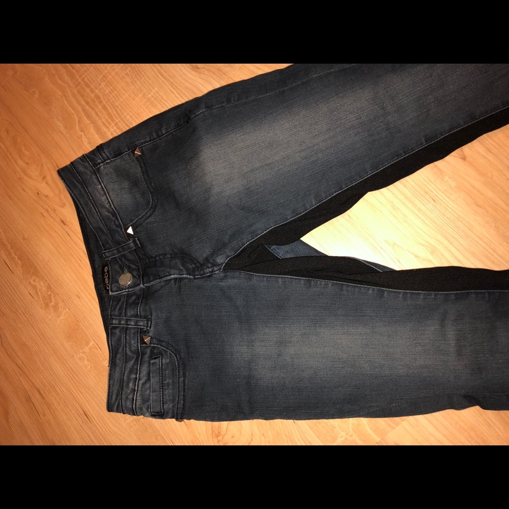 Studded skinny jeans with inner thigh detail